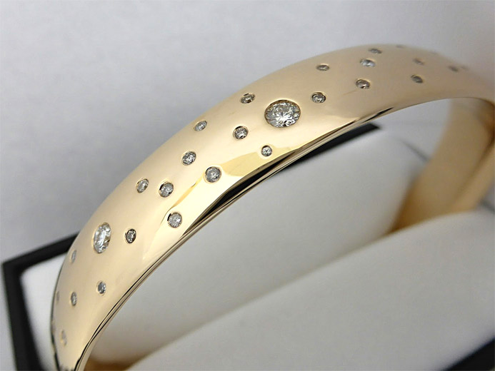 gold bangle made from old gold with diamonds