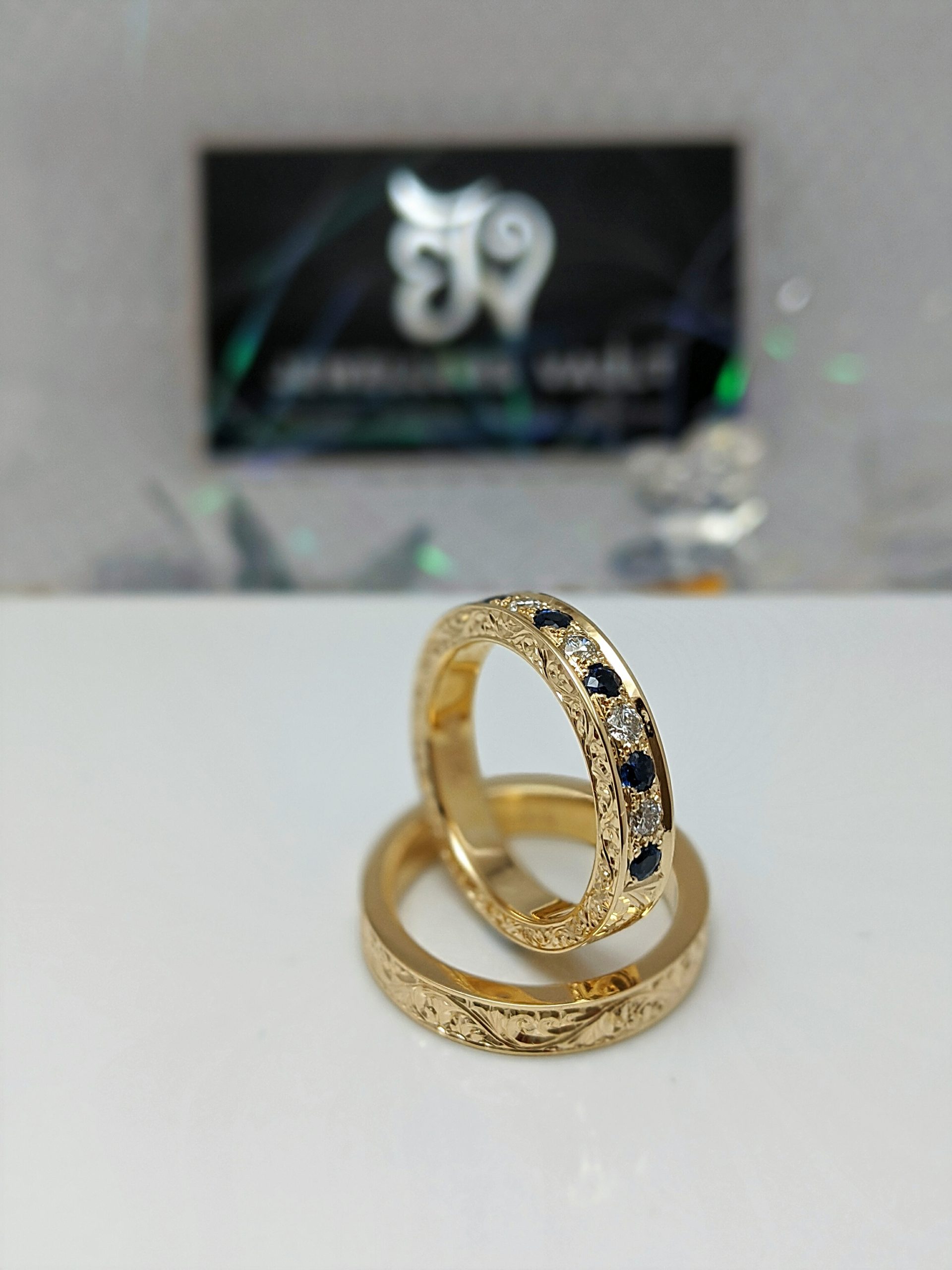 hand engraving sapphire and diamond wedding rings